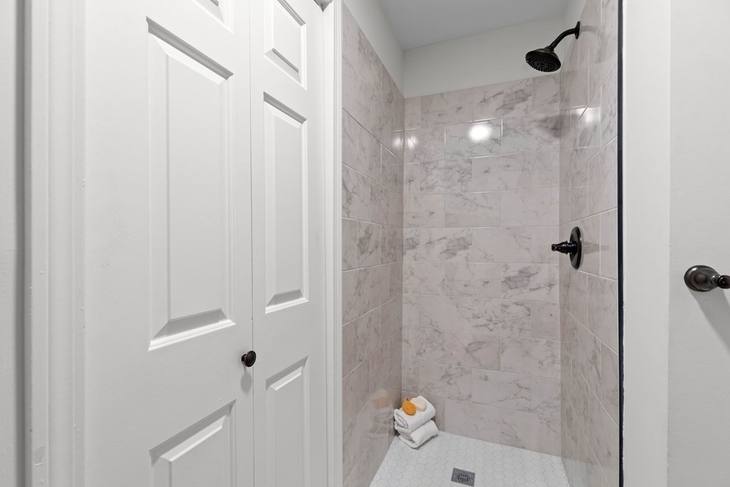 65 Glen Road, Unit H2 Brookline, MA 02445 - Photo 28 of 39 a bathroom with a shower