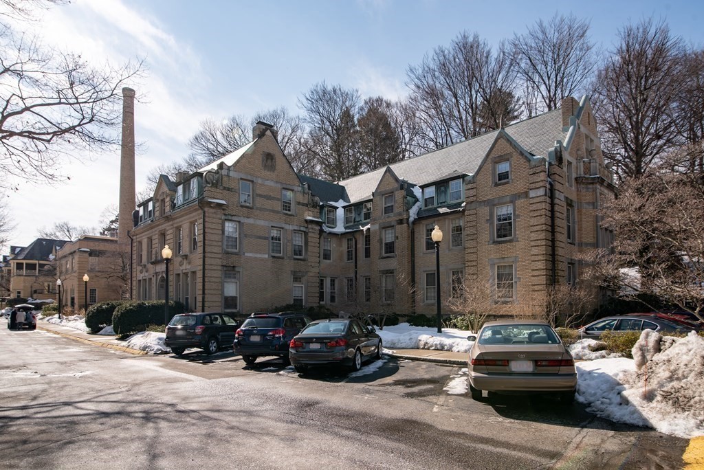 65 Glen Road, Unit H2 Brookline, MA 02445 - Photo 36 of 39 a car parked in front of a house