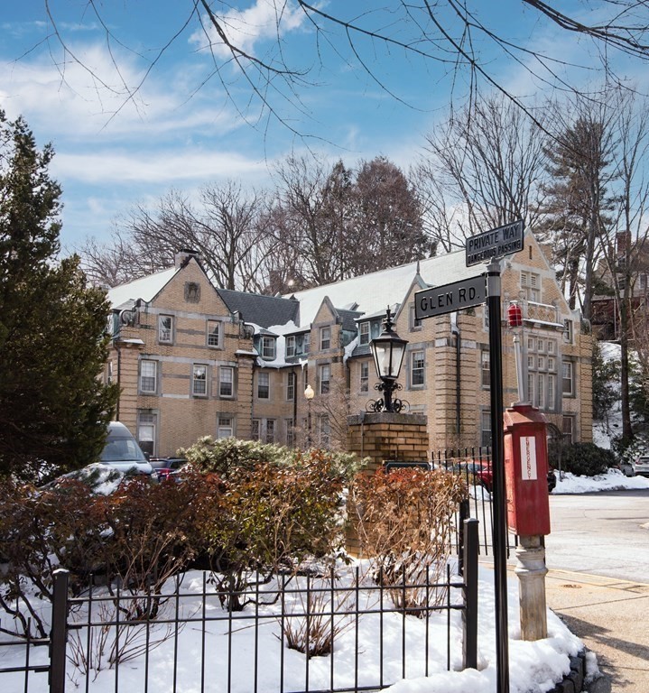 65 Glen Road, Unit H2 Brookline, MA 02445 - Photo 38 of 39 a front view of a house with a yard