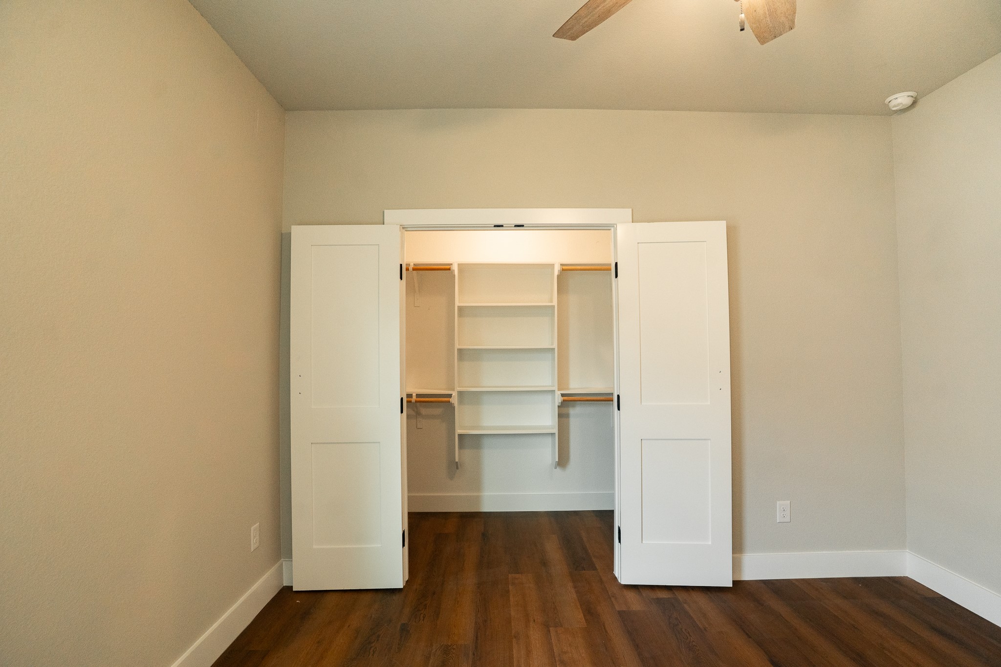 305 String Prairie Way Smithville, TX 78957 - Photo 22 of 26 a view of a room with wooden floor