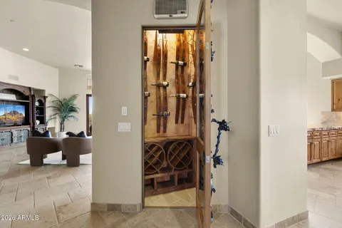 a bathroom with double vanity sinks a mirror and a shower