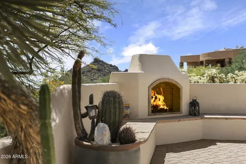 a kitchen with a sink cabinets and appliances
