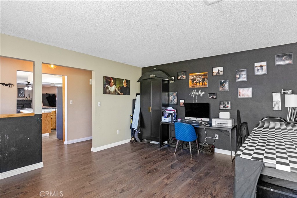 21921 Fig Court Tehachapi, CA 93561 - Photo 18 of 44 a living room with furniture and a flat screen tv