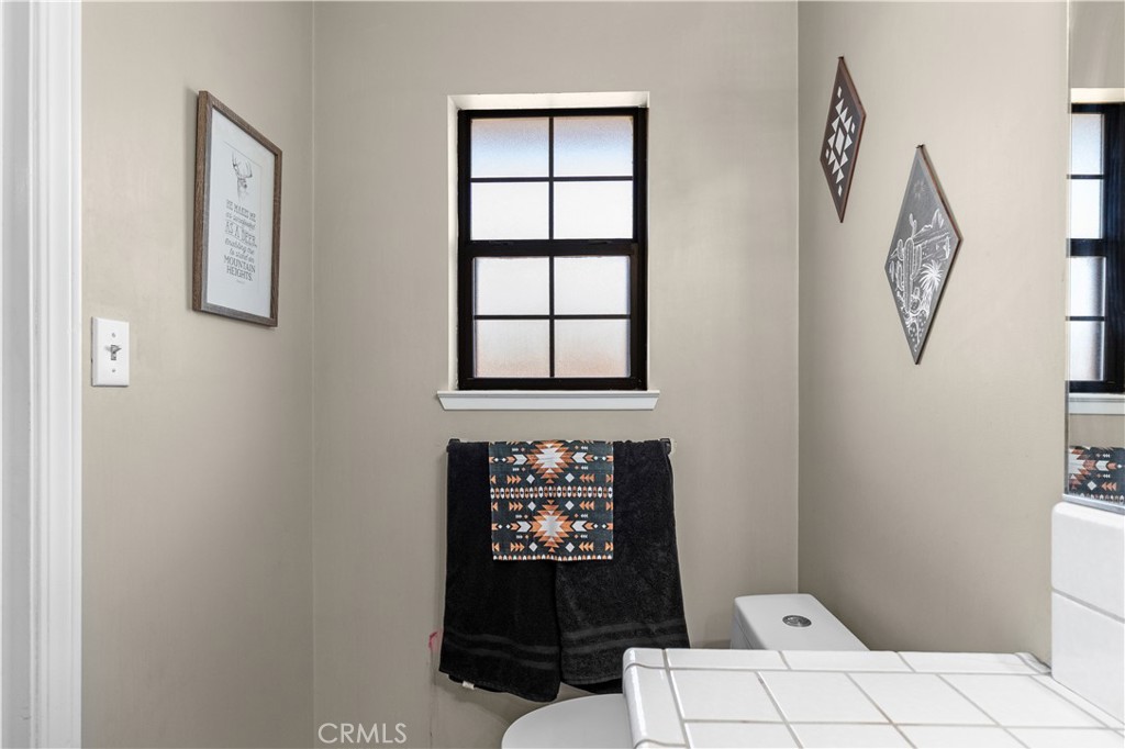 21921 Fig Court Tehachapi, CA 93561 - Photo 30 of 44 a view of an entryway with wall paintings