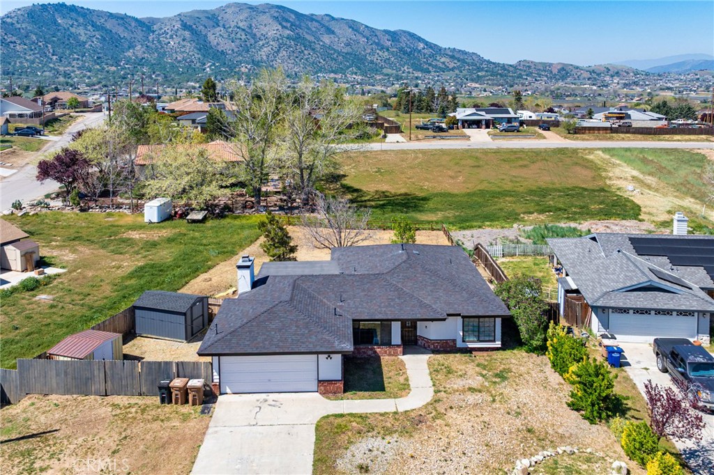21921 Fig Court Tehachapi, CA 93561 - Photo 43 of 44 an aerial view of a house with a garden and lake view