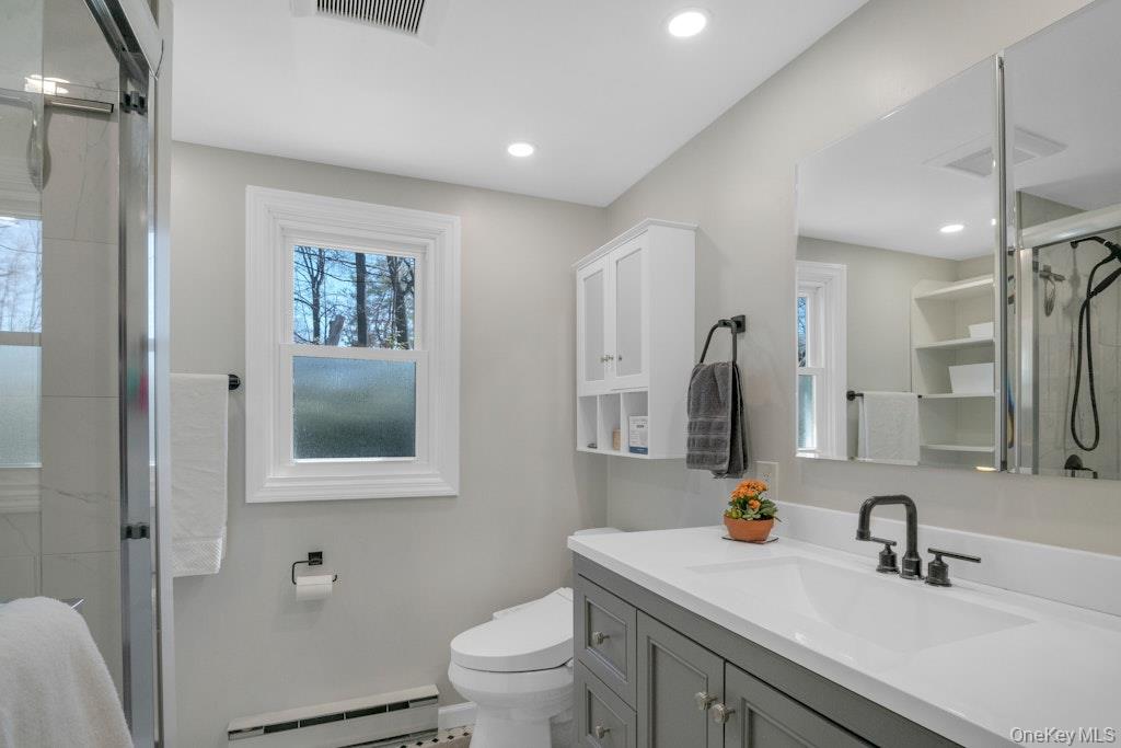10 Locust Road Brewster, NY 10509 - Photo 10 of 21 a bathroom with a sink toilet and shower