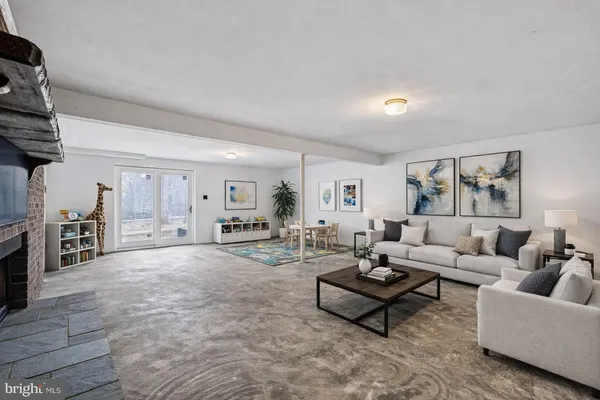 a view of a hallway with wooden floor and closet