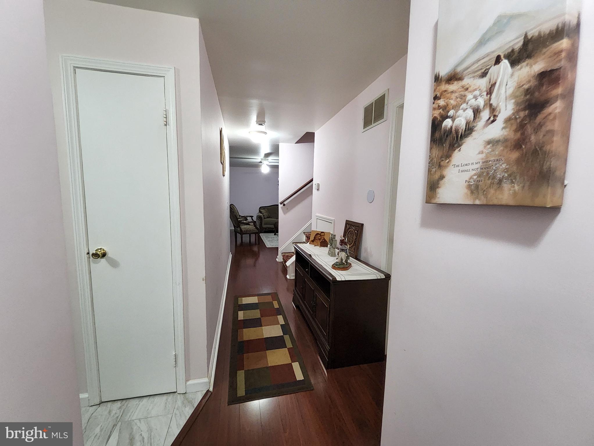 2 Adam Court Eastampton, NJ 08060 - Photo 15 of 34 a view of a hallway with wooden floor and a bathroom