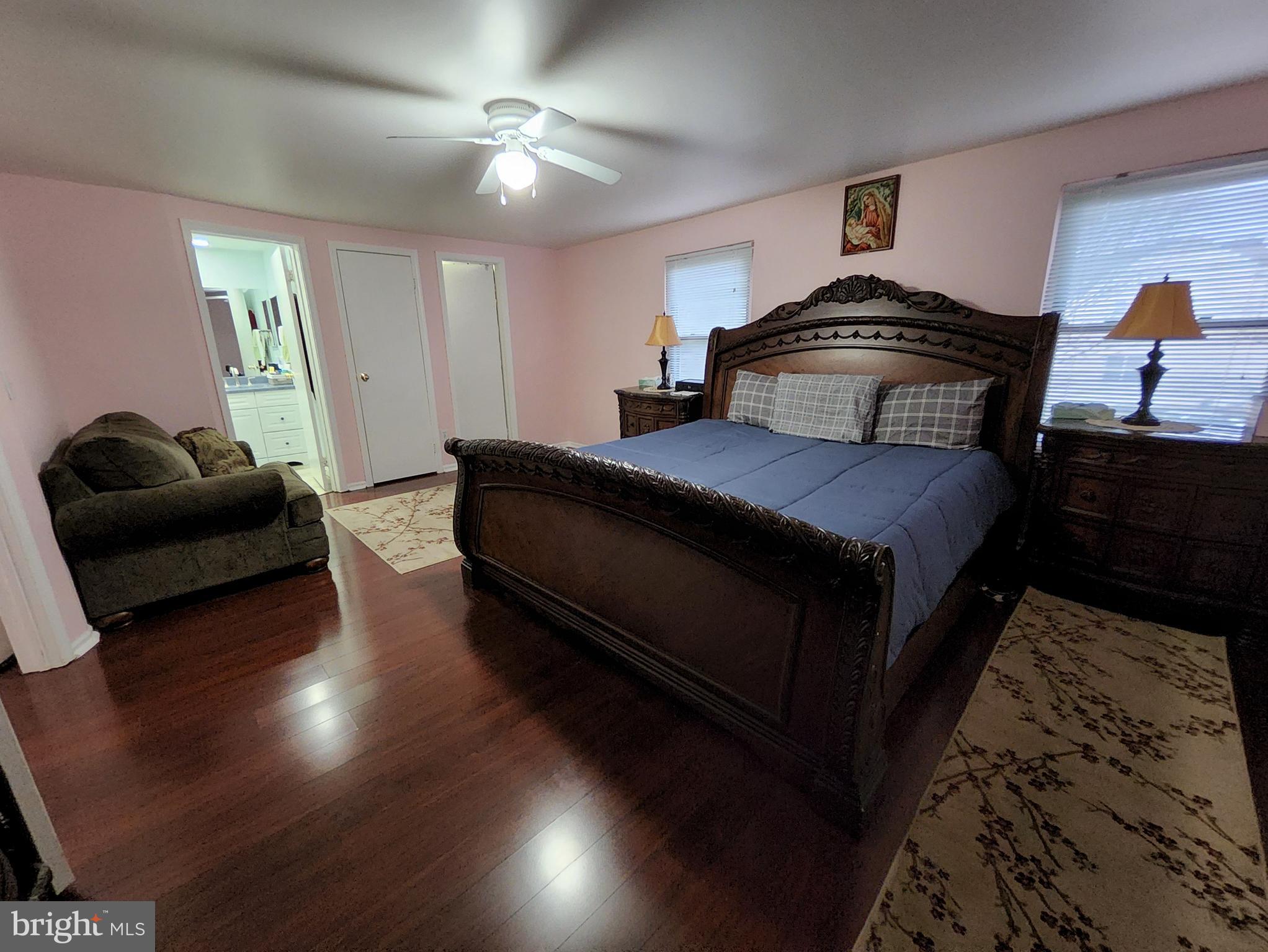 2 Adam Court Eastampton, NJ 08060 - Photo 18 of 34 a bedroom with a bed and a couch