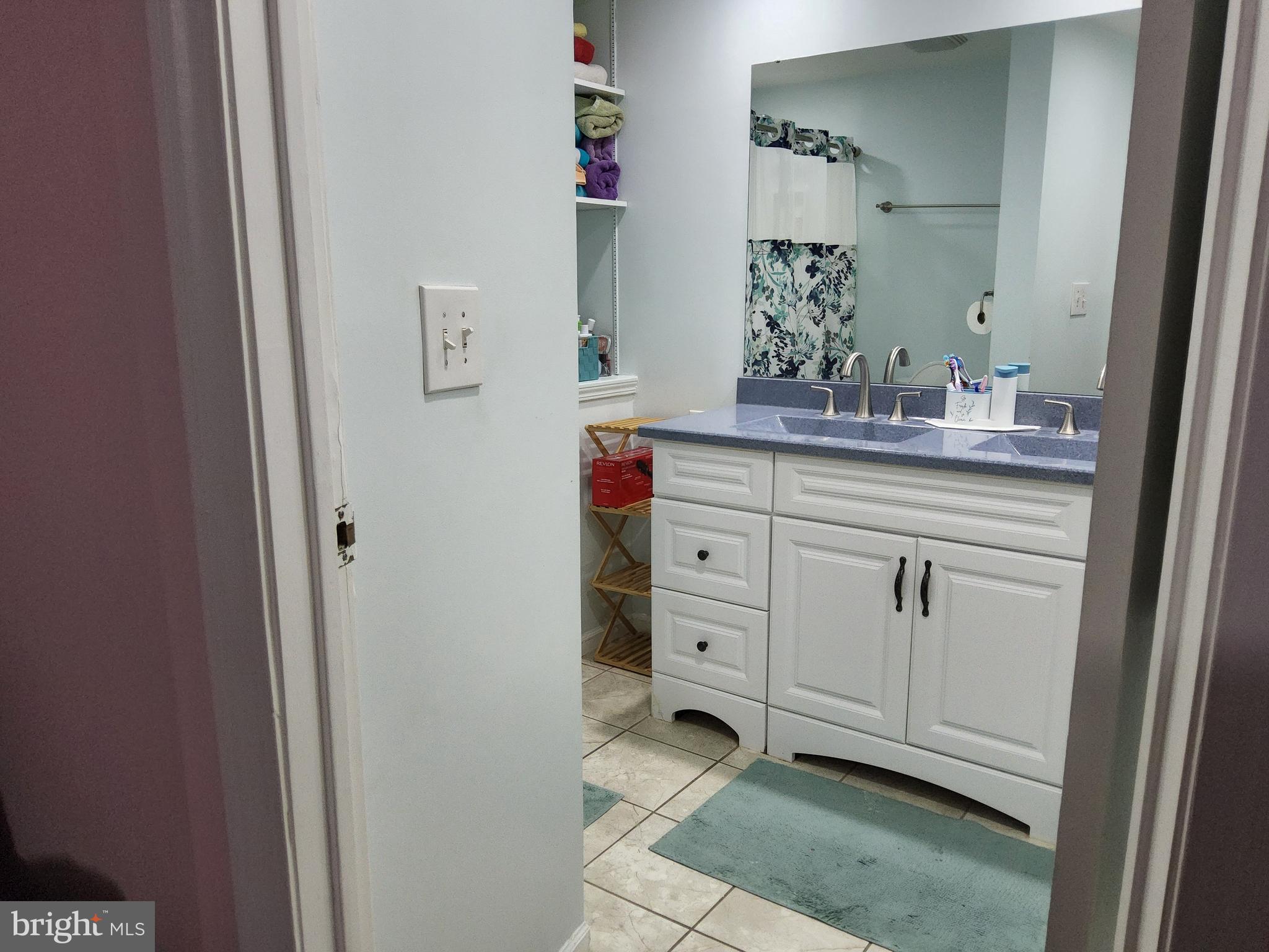 2 Adam Court Eastampton, NJ 08060 - Photo 22 of 34 a bathroom with a granite countertop sink and a mirror