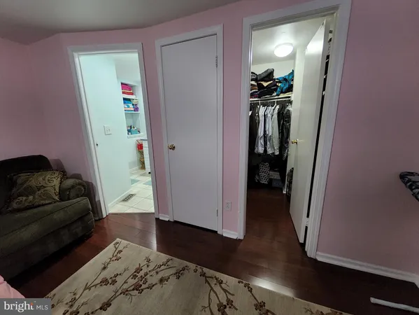 a view of a livingroom from a hallway