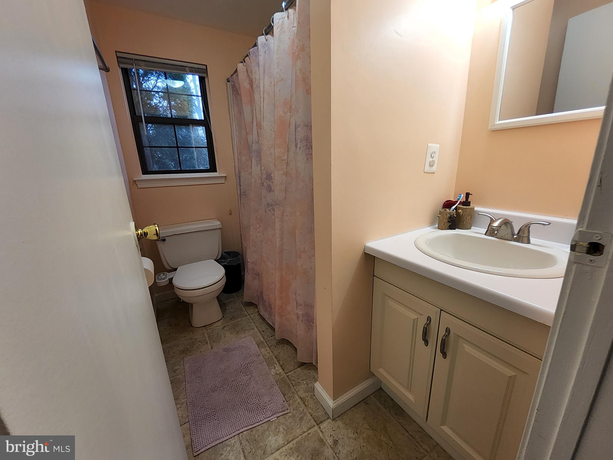 2 Adam Court Eastampton, NJ 08060 - Photo 26 of 34 a bathroom with a sink toilet and vanity