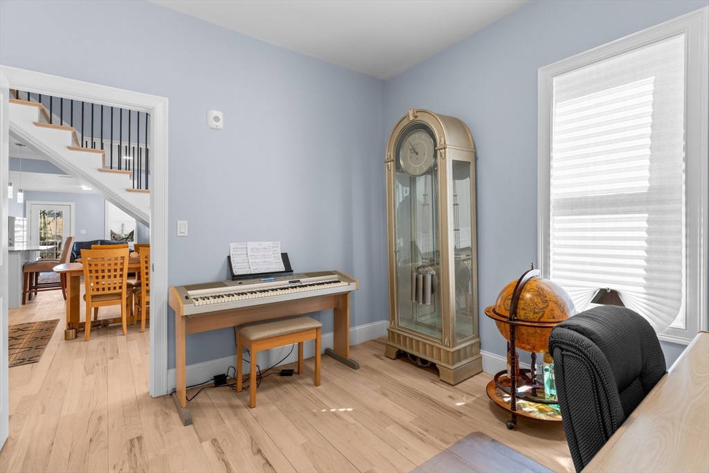 7 Waumbeck Street, Unit 3 Boston, MA 02121 - Photo 14 of 21 a living room with furniture and a window