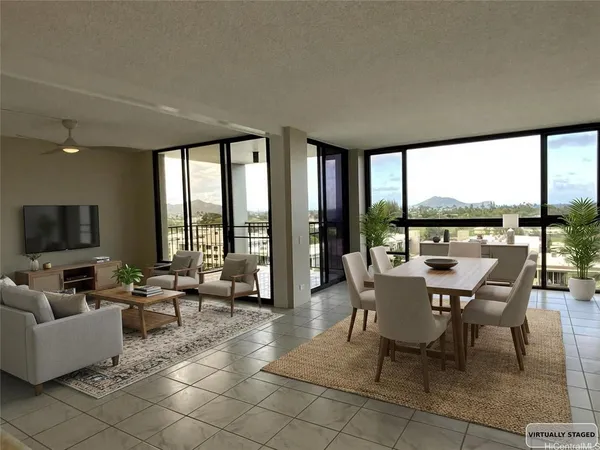 a dining room with furniture and large windows