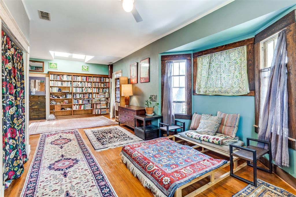 5020 Junius Street Dallas, TX 75214 - Photo 16 of 31 a living room with furniture and a rug