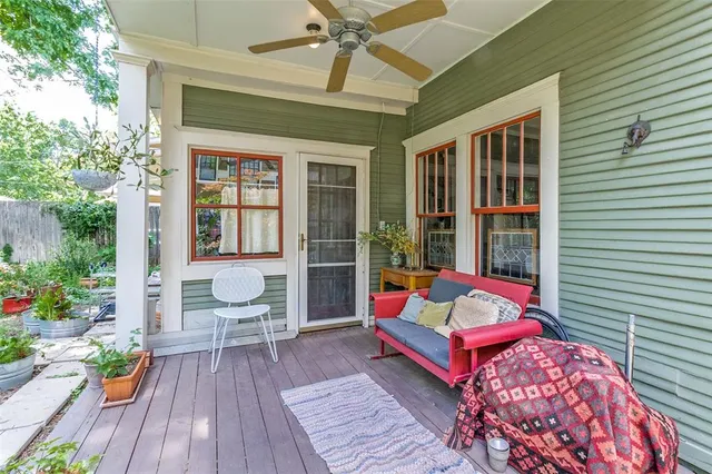 a bedroom with a bed and a potted plant