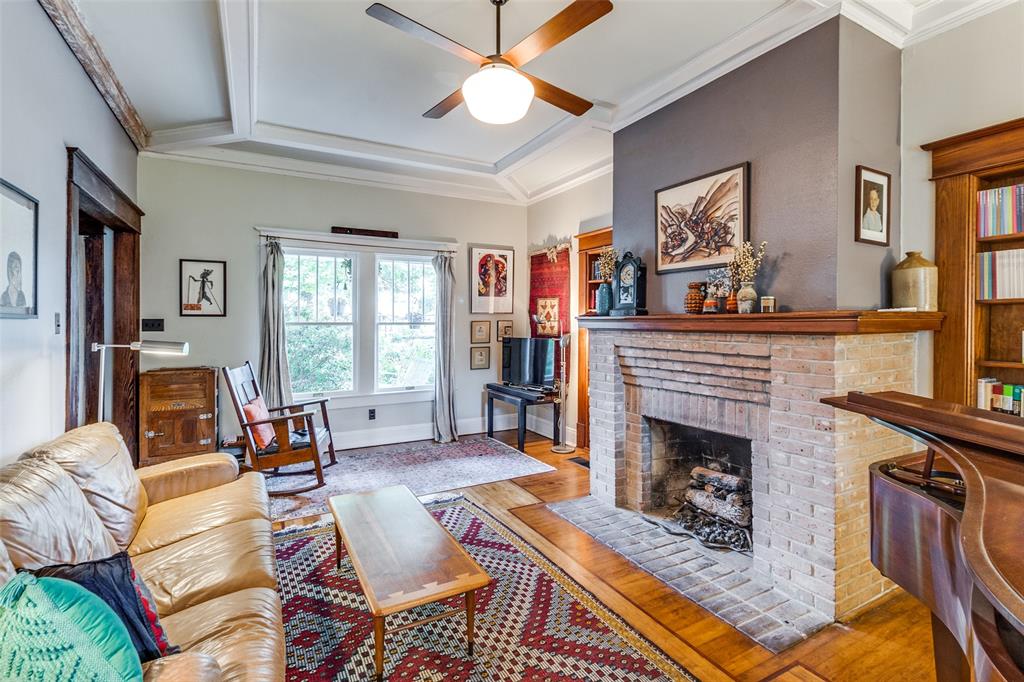 5020 Junius Street Dallas, TX 75214 - Photo 8 of 31 a living room with furniture and a fireplace