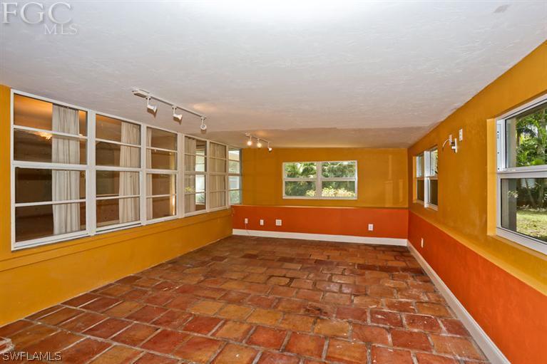 1806 Ardmore Road Fort Myers, FL 33901 - Photo 8 of 11 a view of an empty room with a window