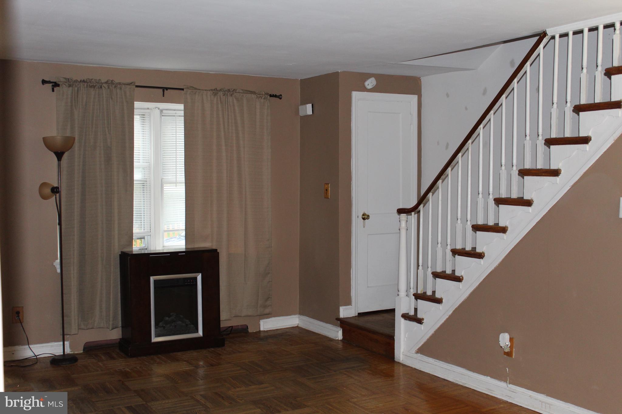612 Briarcliff Road Upper Darby, PA 19082 - Photo 6 of 18 Living Room with parquet floors