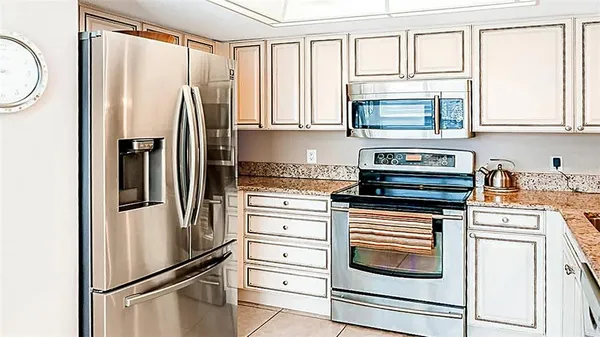 a view of a dining room with furniture and window