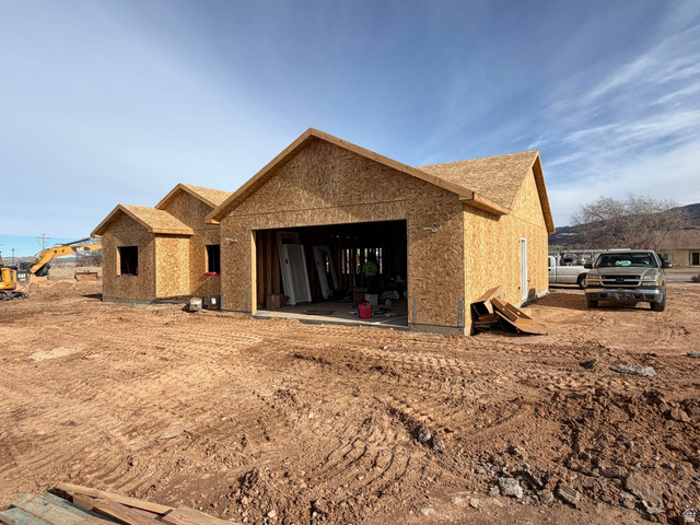 4062 North 970th East Enoch, UT 84721 - Photo 2 of 3 Rear view of property featuring a patio