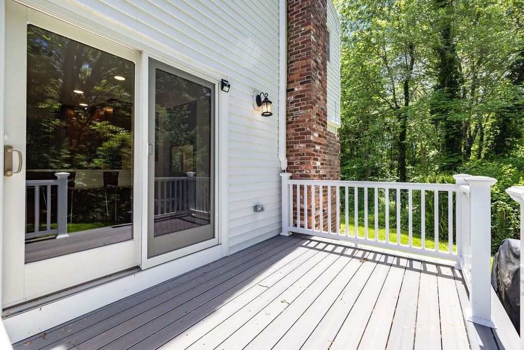 21 Vanderbelt Road Acton, MA 01720 - Photo 35 of 36 a view of backyard with a deck