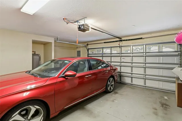 a black car parked in front of a building