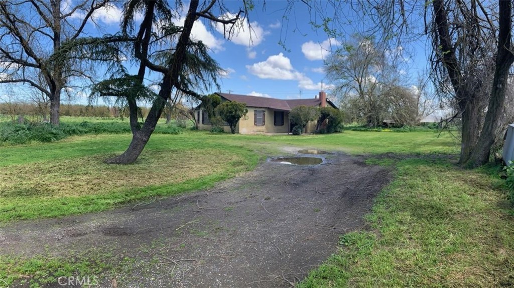 11316 Road 25 Madera, CA 93637 - Photo 1 of 1 a view of a house with a yard