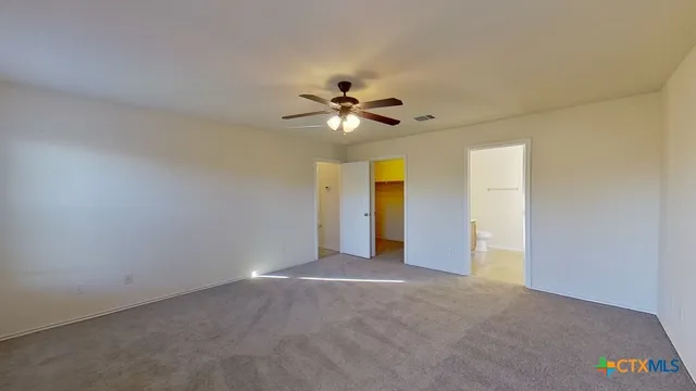 a view of an empty walk in closet