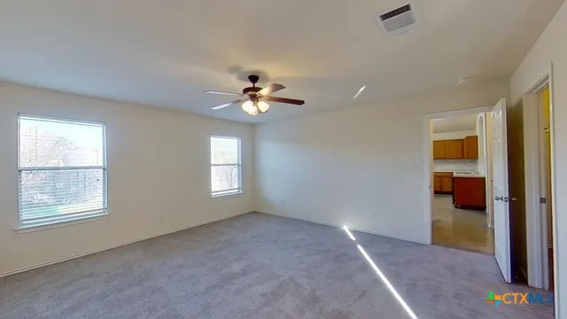 a view of an entryway with hallway