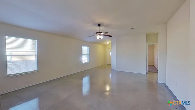 a view of a livingroom with a window