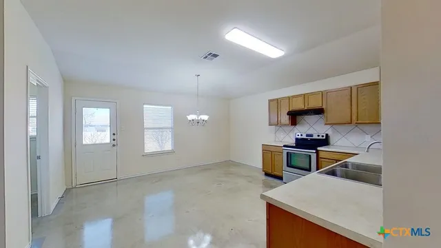 a view of work space with windows