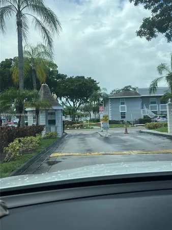 a view of multiple houses with a yard