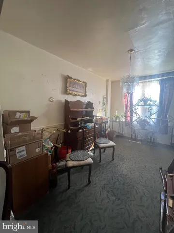 a living room with furniture and window