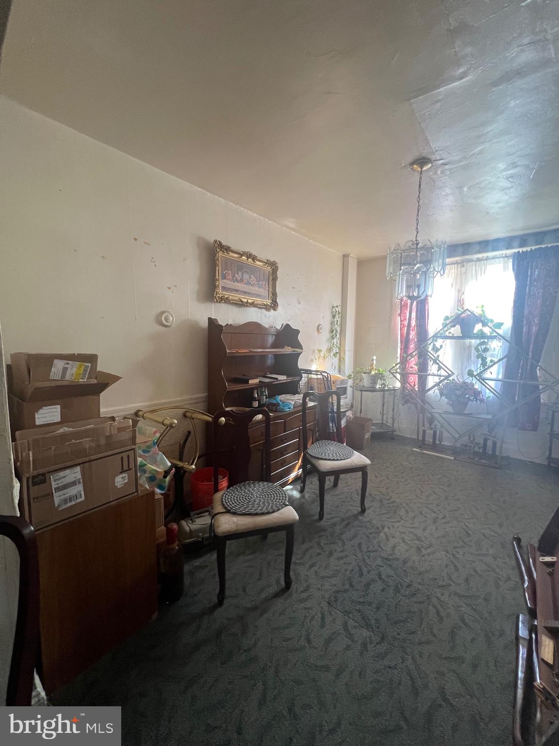 4506 Reisterstown Road Baltimore, MD 21215 - Photo 15 of 22 a living room with furniture and window