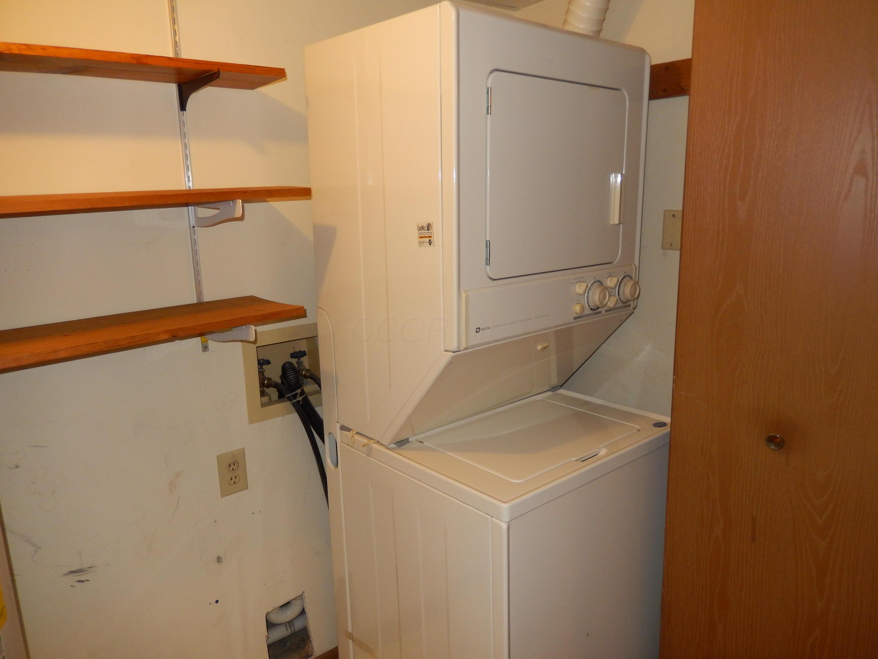 3939 Karl Road, Unit 122 Columbus, OH 43224 - Photo 24 of 57 Laundry hookup with stack washer & dryer that stays. It will fit a full size washer & dryer.