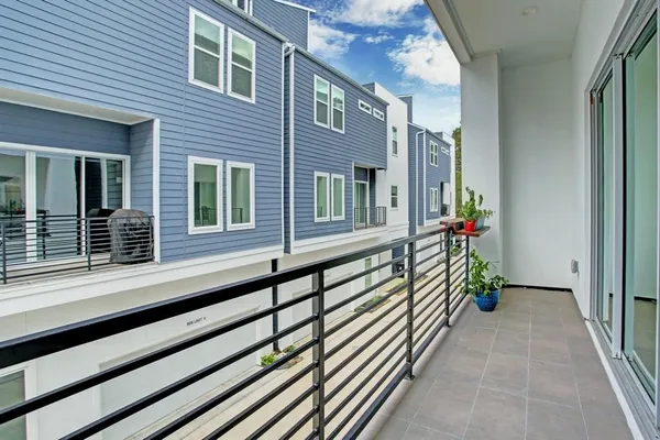a view of a house with a balcony