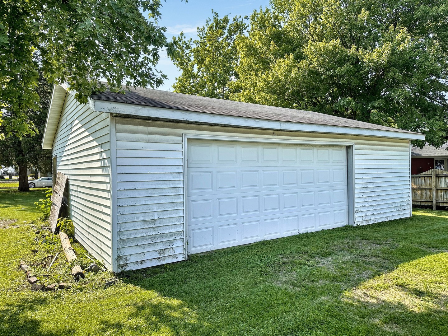 615 South Central Street Gilman, IL 60938 - Photo 2 of 10 a view of a backyard with plants