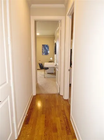 a en suite bathroom with a granite countertop sink and a mirror