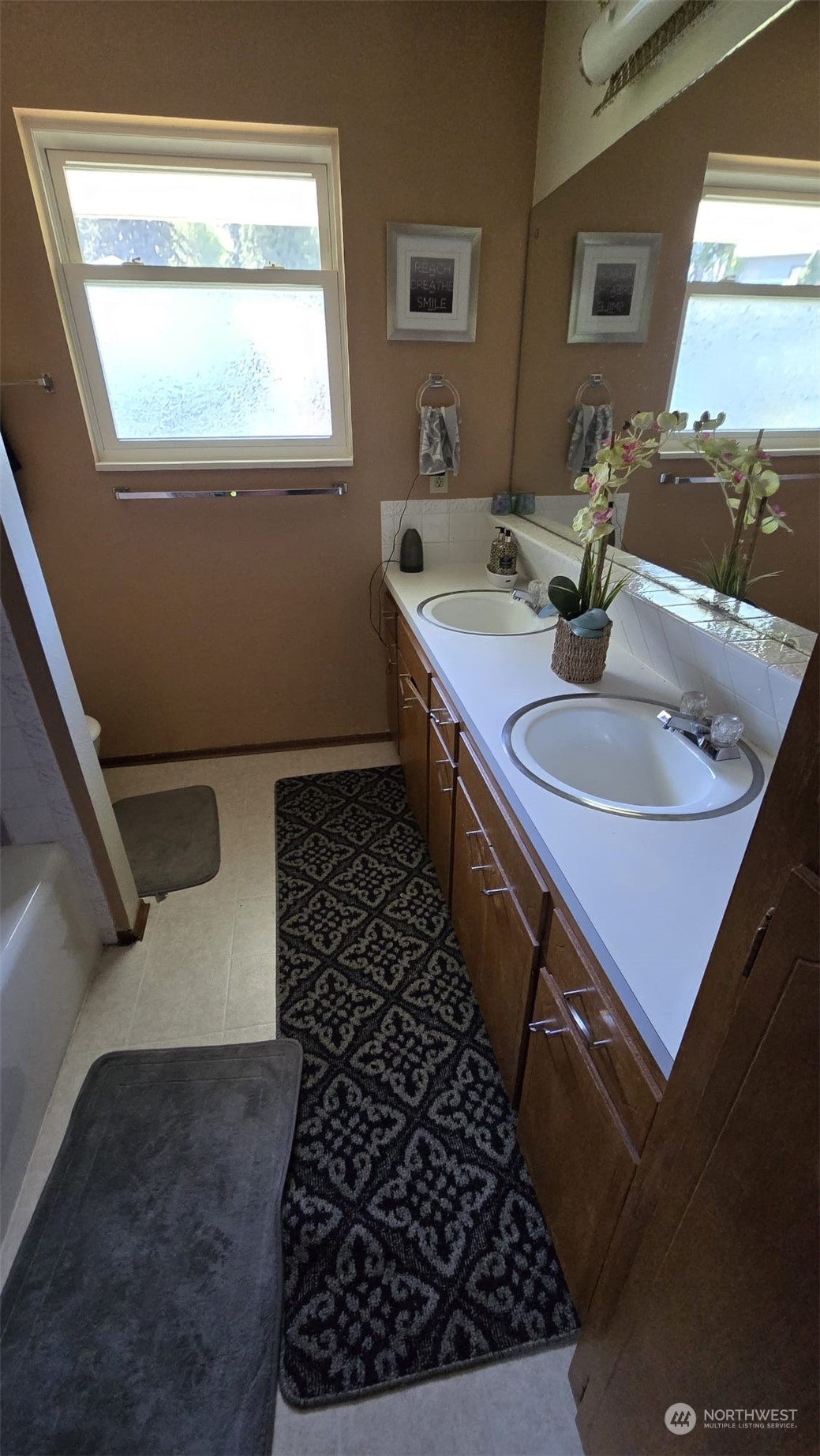 4403 Thomson Avenue Everett, WA 98203 - Photo 8 of 18 a bathroom with a sink and a mirror