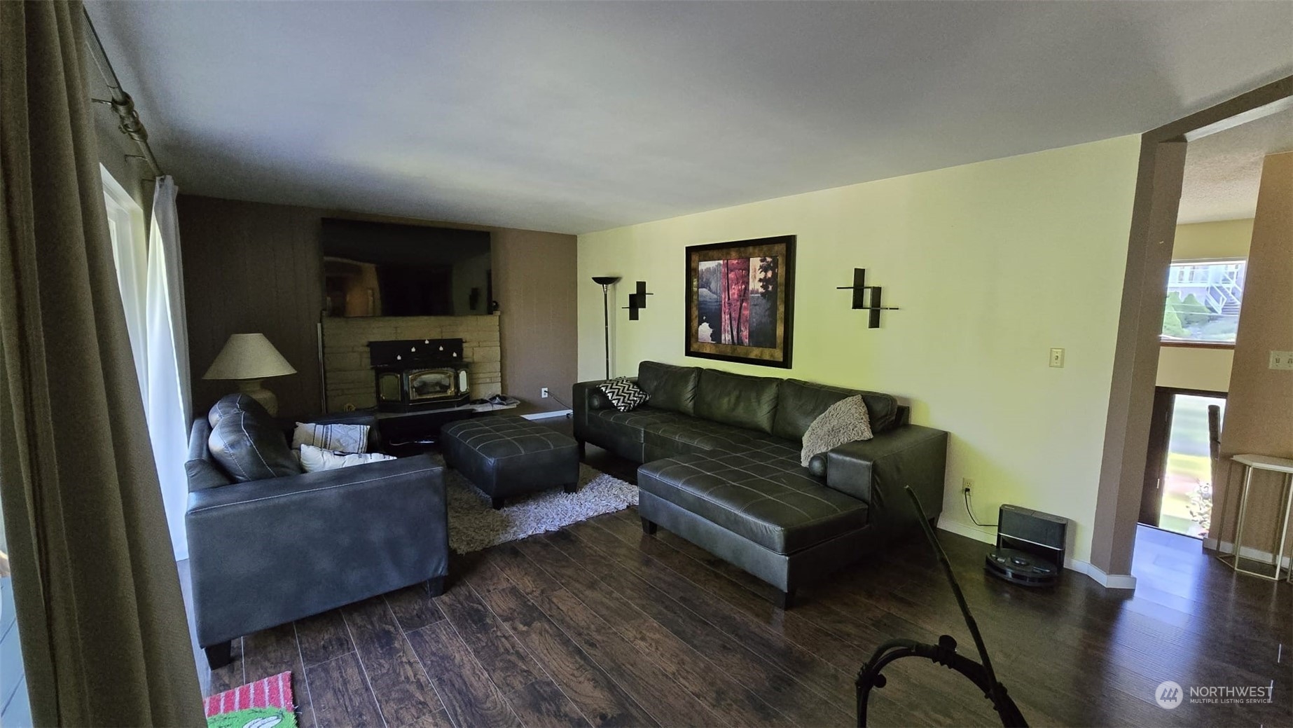 4403 Thomson Avenue Everett, WA 98203 - Photo 9 of 18 a living room with furniture and a fireplace