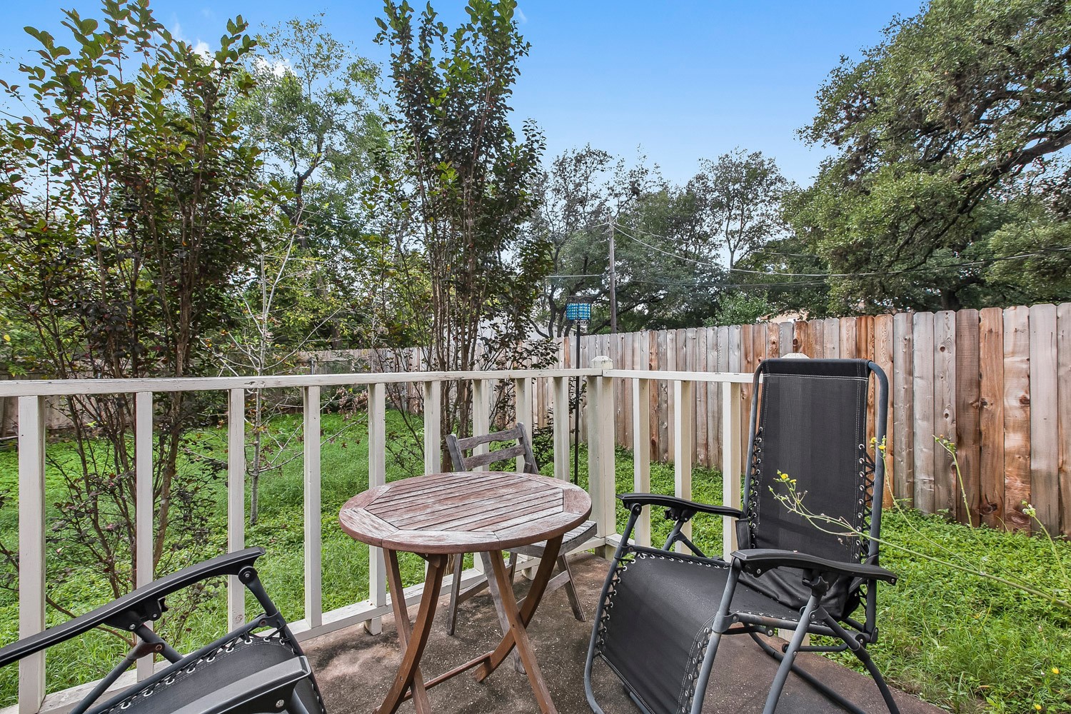 6029 Old Fredericksburg Road, Unit A Austin, TX 78749 - Photo 19 of 20 a view of a chairs and table in the patio