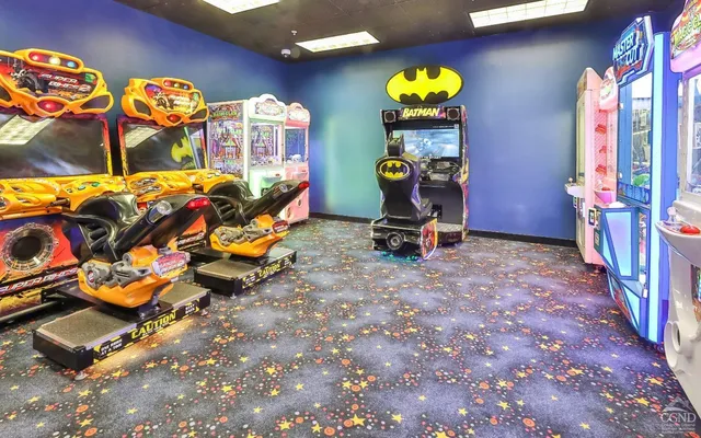 a view of game room with gym equipment