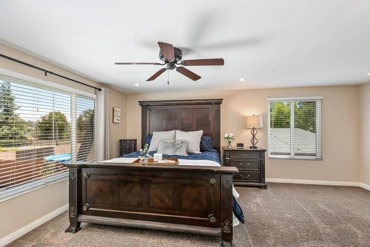 14437 Hillndale Way Poway, CA 92064 - Photo 12 of 35 a living room with furniture and a large window