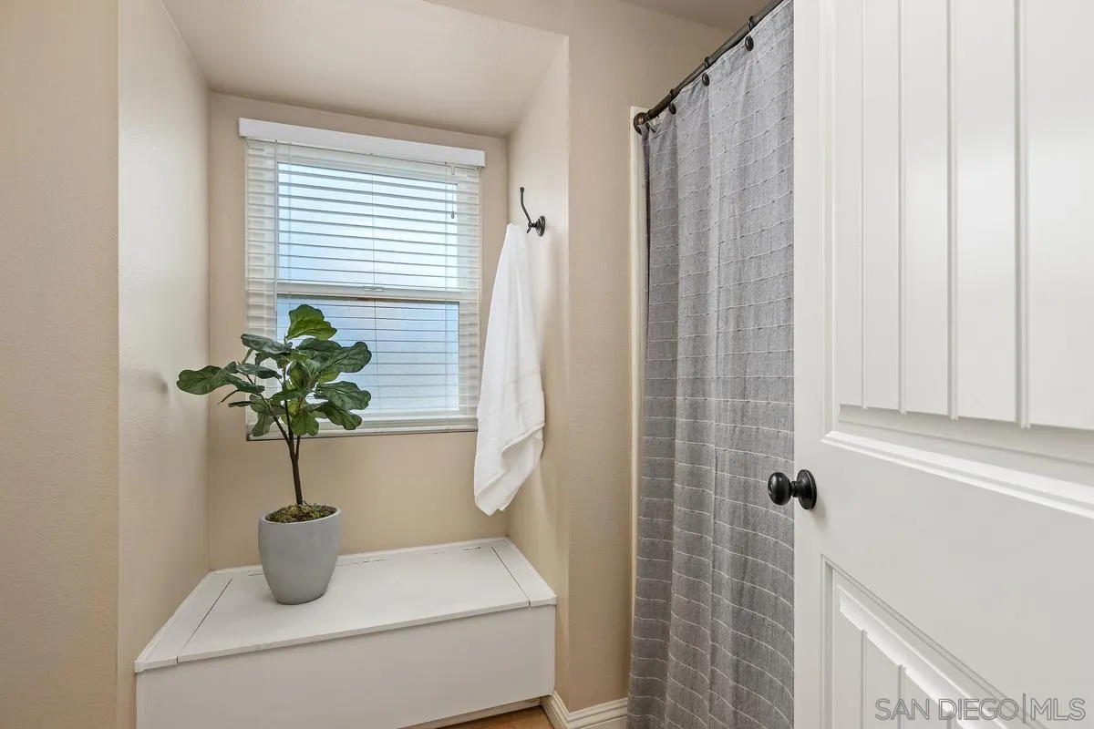 14437 Hillndale Way Poway, CA 92064 - Photo 16 of 35 a vase of flowers sitting on a table