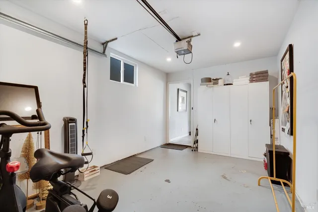 a view of a livingroom with furniture and entryway