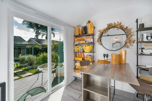 a bathroom with a sink a mirror and shower