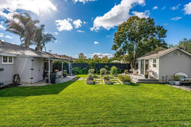 a view of a swimming pool with a patio