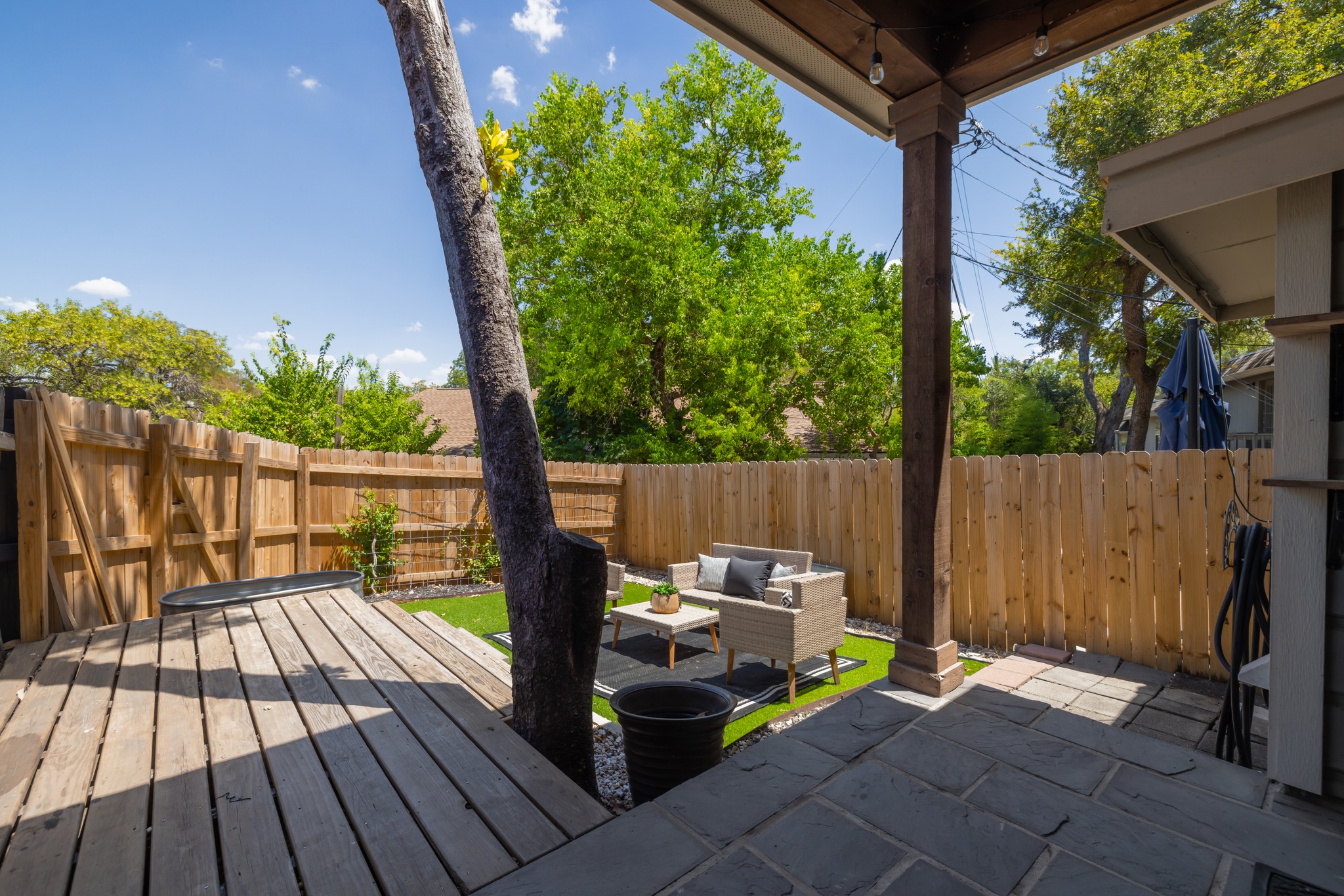 2000 Lightsey Road, Unit 5 Austin, TX 78704 - Photo 20 of 24 This backyard was truly made for entertaining! Fully fenced and private, this adorable private backyard is an enchanting retreat that immediately makes you feel miles away from the city