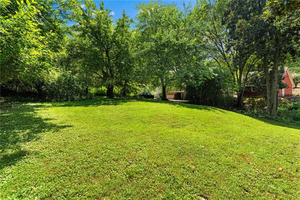 1118 Austin Avenue Northeast Atlanta, GA 30307 - Photo 12 of 12 a swimming pool with wooden fence